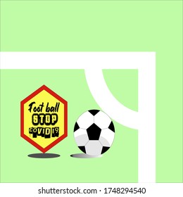 a ball approaches a corner on an empty field, because world soccer is stopped because of the corona virus (covid19)