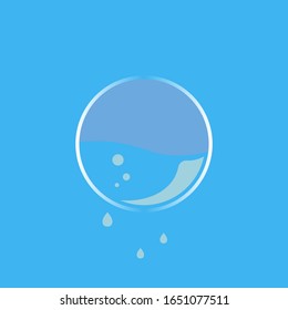 Una bola llena de agua de la que gotas están goteando