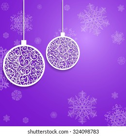 Ball openwork paper on lilac background with snowflake