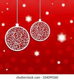 Ball openwork paper on red background with snowflake