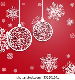 Ball openwork paper on red background with  snowflake