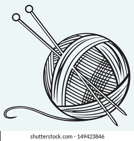 Ball of yarn and needles isolated on blue background