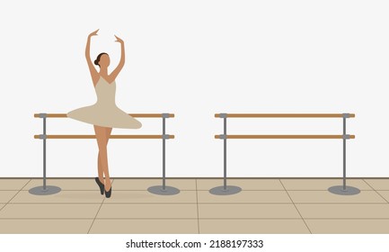 Ballerina dancing near the ballet barn indoors