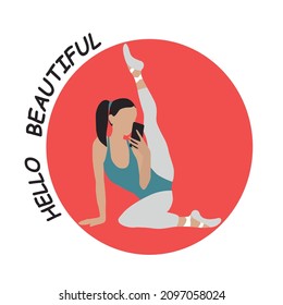 The ballerina poses with the phone, demonstrates her flexibility. Young and attractive girl in a red circle with the inscription.
