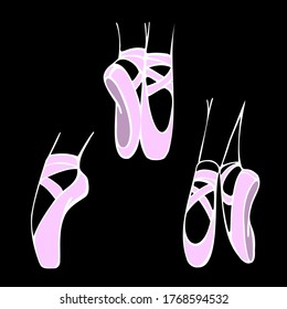 Ballerina's feet in pink pointe shoes on the black background