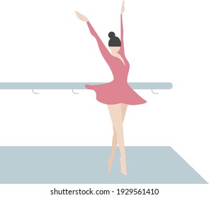 Ballet dancer practicing her routine in front of a mirror in a dance studio
