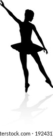 Ballet dancer in silhouette dancing in pose or position