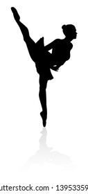 Ballet dancer woman in silhouette dancing in posed position