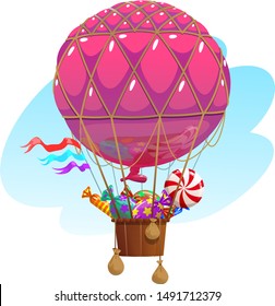 Balloon with a basket filled with sweets.