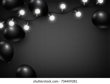 Balloon and light bulb on black background