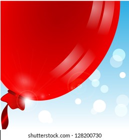 balloon of red color on a blue background