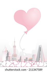 Balloon in the shape of a heart on the background of the city 