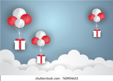 Balloon white floating and Gift Box on in the air blue sky background.Paper and craft art