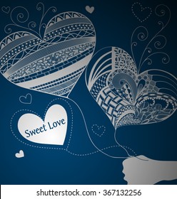 Balloons of hearts in hand. Doodle. Valentine's Day. Blue background