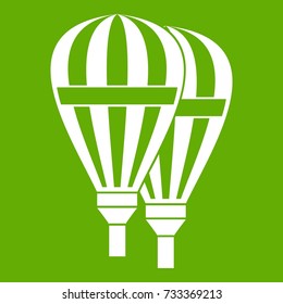 Balloons icon white isolated on green background. Vector illustration