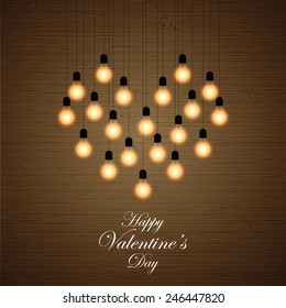 Balls lights arranged in a heart shape. Valentines day background