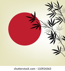 bamboo branches on a background of the red sun