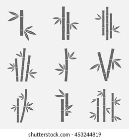 Bamboo icons vector set isolated on a light background. Black sign of bamboo stems with leaves in a flat style. Simple silhouettes bamboo forest, jungle or trees.