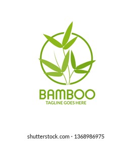 Bamboo leaves with circle logo isolated over a white background