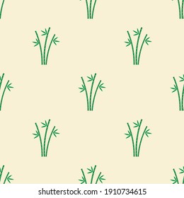 Bamboo Stems with Green Leaves on Yellow Background seamless