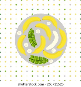 banana circle. Located in the center of the image circle. It is, bananas, pieces, palm leaves and peeled bananas. Background made a pattern of dots.