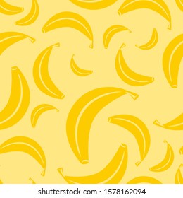 Banana fruit chaotic seamless pattern. Simple vector fruit shapes. Healthy lifestyle and diet food. Yellow background. EPS 8