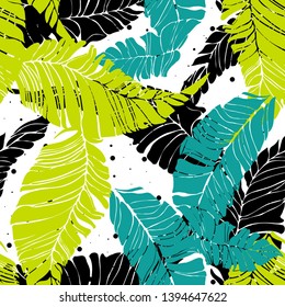 Banana leaves yellow blue green light green floral print for fabric seamless pattern. Palm leaf for swimsuits endless background. Exotic leaves tropical print.