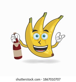 Banana mascot character holding a bottle. vector illustration