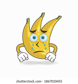Personaje de mascota bananera con expresión triste. ilustración vectorial