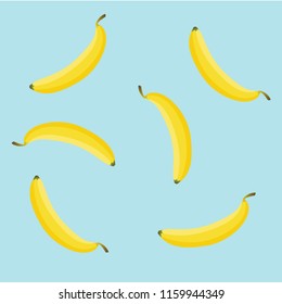 Banana pattern on blue light background. Vector background with yellow bananas. Fresh bananas.