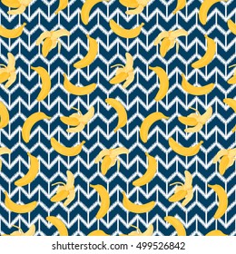 Banana Seamless Pattern on ethnic blue and white background. Fashion tropical textile print. Contemporary wallpaper.