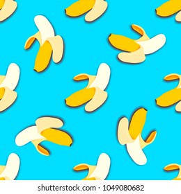 Banana seamless pattern in paper cut style. Origami yelllow tropical fruit on blue.