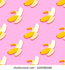 Banana seamless pattern in paper cut style. Origami yelllow tropical fruit on pink.