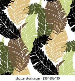 Banana Tropical leaves floral print exotic seamless pattern. The texture of the fabric leaves of banana and palm trees. Exotic Hawaiian print for swimsuits.