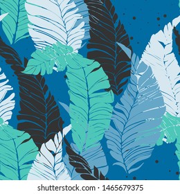 Banana Tropical leaves floral print exotic seamless pattern. The texture of the fabric leaves of banana and palm trees. Exotic Hawaiian print for swimsuits.
