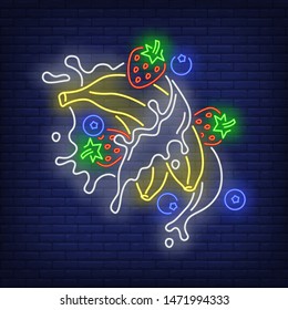 Bananas, strawberries, blueberries and splashes neon sign. Fruit drink, beverage, freshness design. Night bright neon sign, colorful billboard, light banner. Vector illustration in neon style.