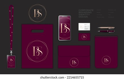 Band S monogram. Gold monogram into thin-lines frame. Identity: lanyard, badge, paper bag, screen, envelope, pen, business card. Purple theme.
