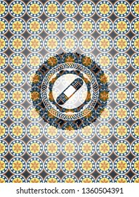 bandage plaster icon inside arabesque badge. arabic decoration.