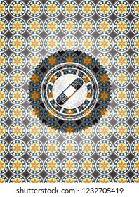 bandage plaster icon inside arabic emblem background. Arabesque decoration.