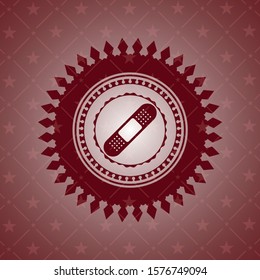 bandage plaster icon inside badge with red background