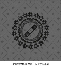 bandage plaster icon inside black badge