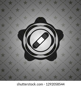bandage plaster icon inside black emblem. Vintage.