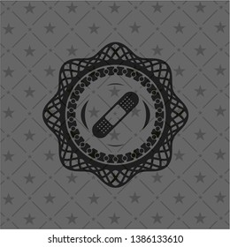 bandage plaster icon inside black emblem. Vintage.