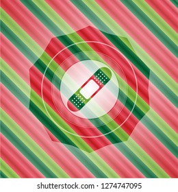bandage plaster icon inside christmas colors emblem.