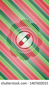 bandage plaster icon inside christmas colors emblem.