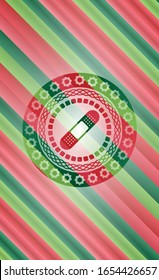 bandage plaster icon inside christmas emblem background.