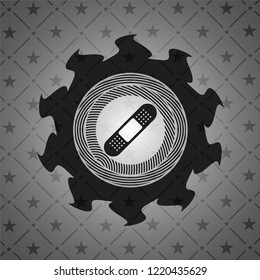 bandage plaster icon inside dark badge or emblem