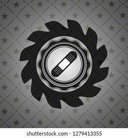 bandage plaster icon inside dark emblem