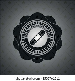 bandage plaster icon inside dark emblem. Retro