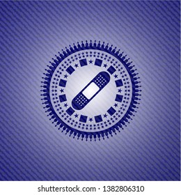bandage plaster icon inside emblem with jean high quality background